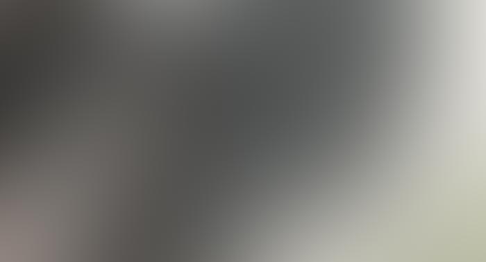 A gray background with some white lines on it
